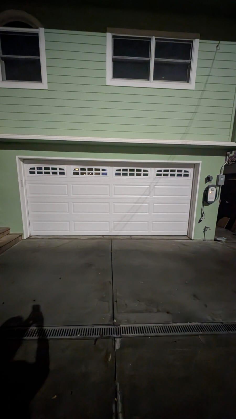 Signs your garage door spring needs replacement