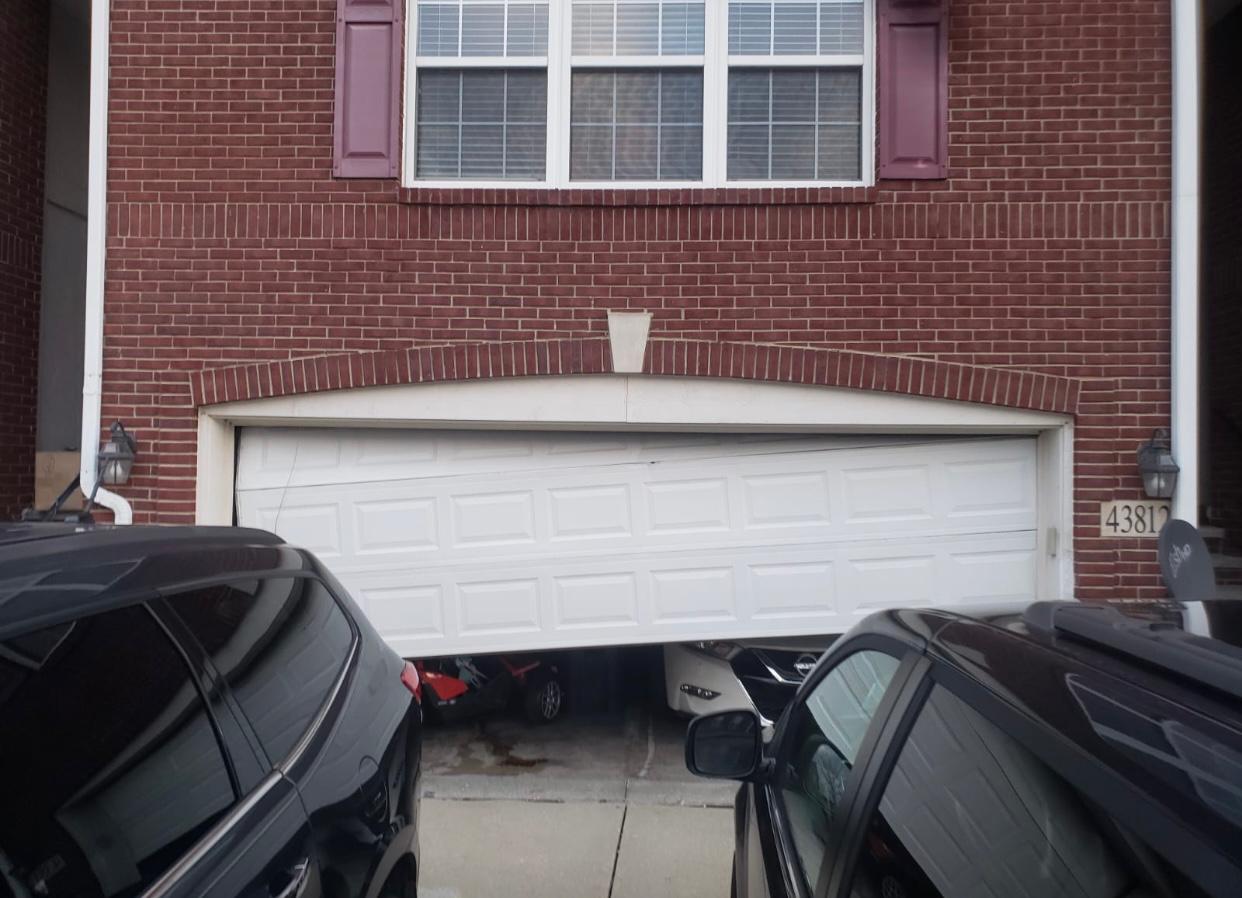 Garage door track and roller repair